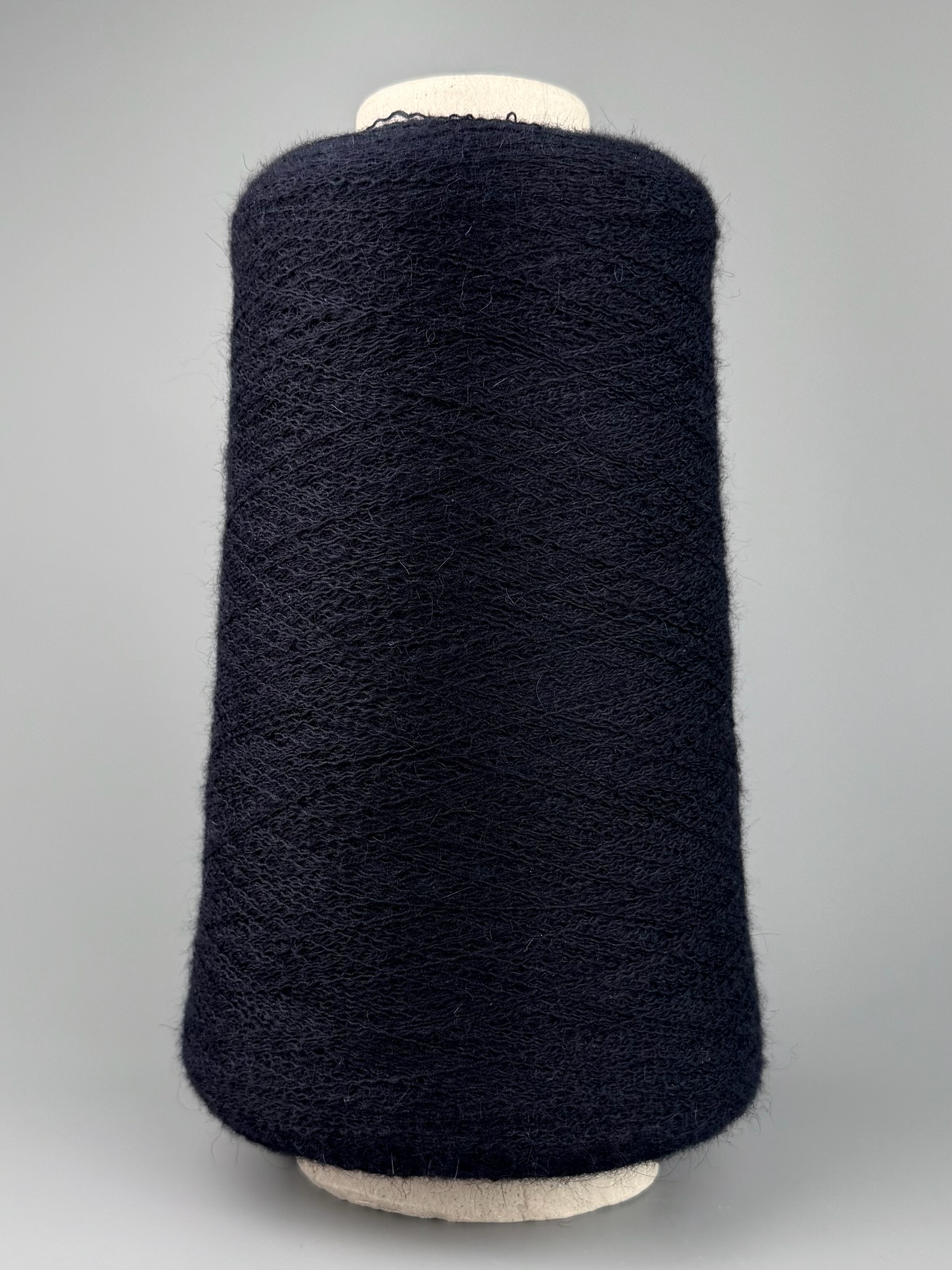 Pecci Filati Art. FLUIDO 2000 m / 100 g – Alpaka Merino Garn mit Polyamid col. Marineblau foto 2